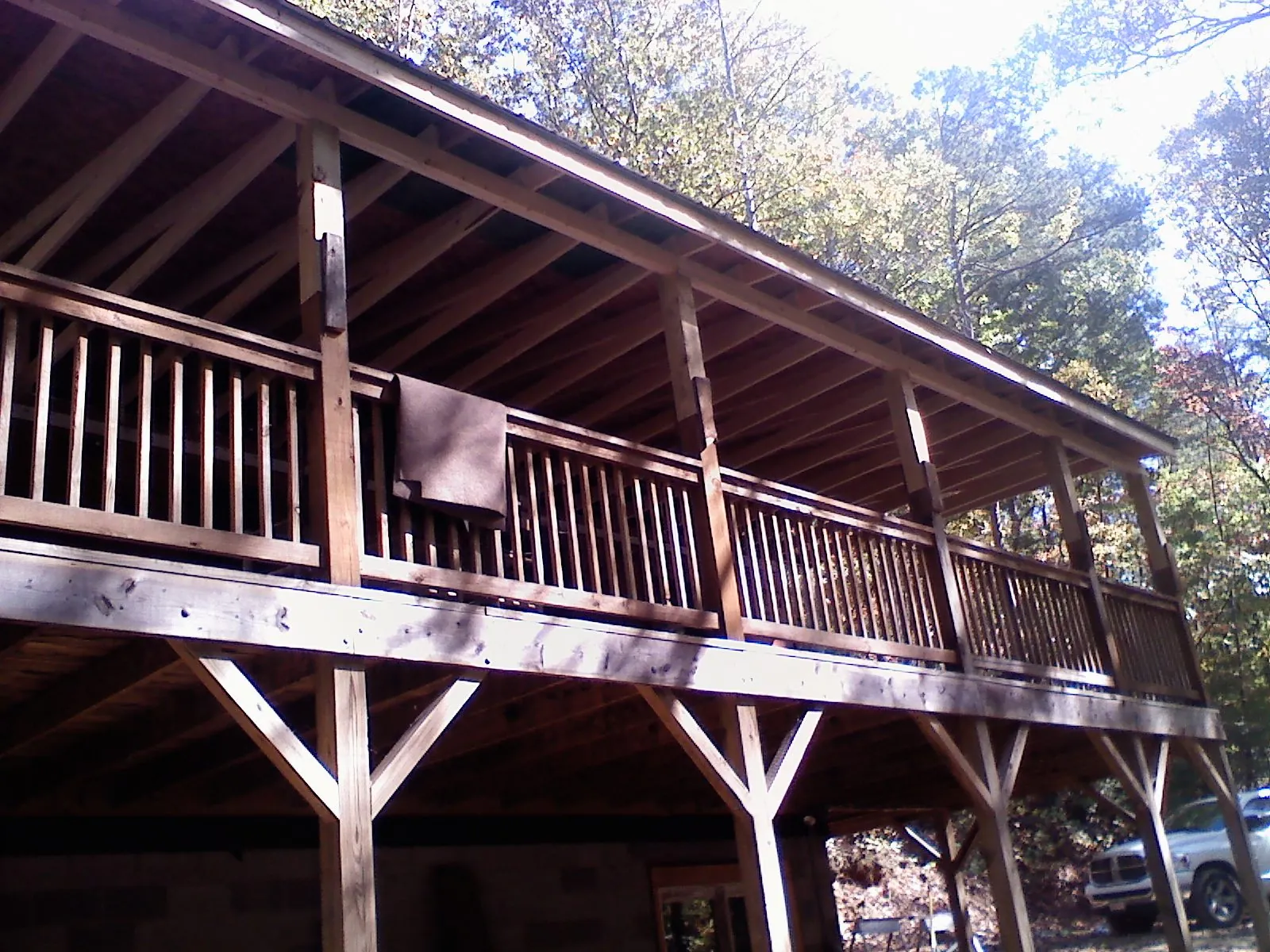 Timber framing under a new elevated porch and deck — Roof Leak Repair in Bismarck by Roofing Brothers